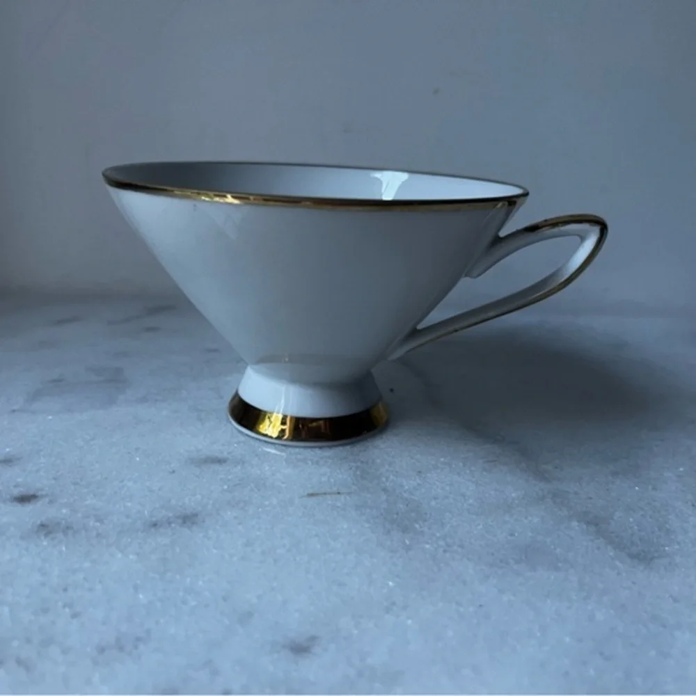 Elegant White floral Teacup with Gold Trim